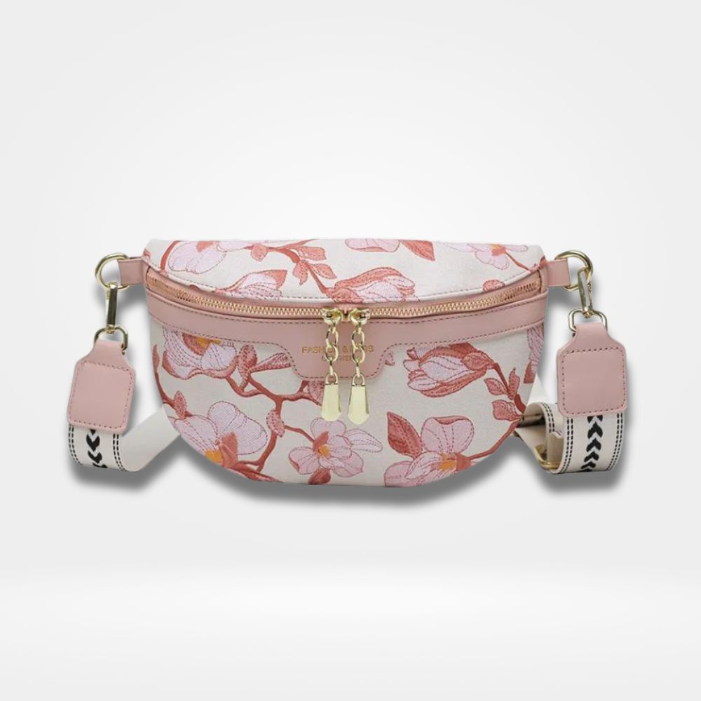 Sac banane rose imprimé fleurs avec bandoulière élégante.