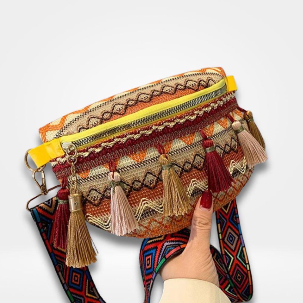 Sac banane bohème chic avec broderies ethniques et pompons colorés — accessoire tendance pour femme